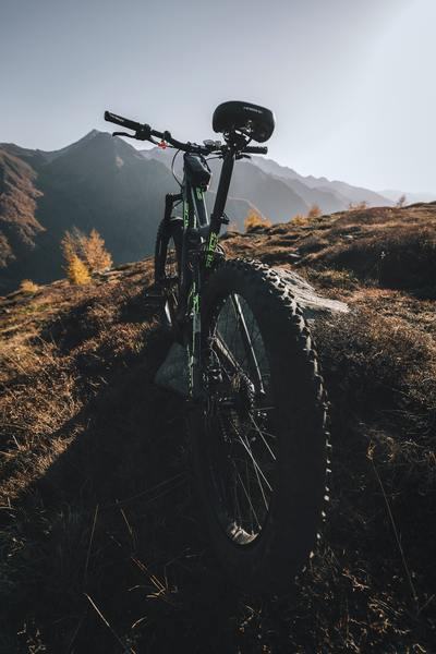 black bike on mountain daytime how to clean