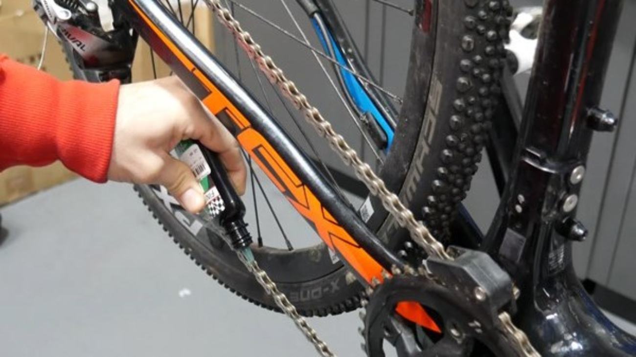apply lube bike chain