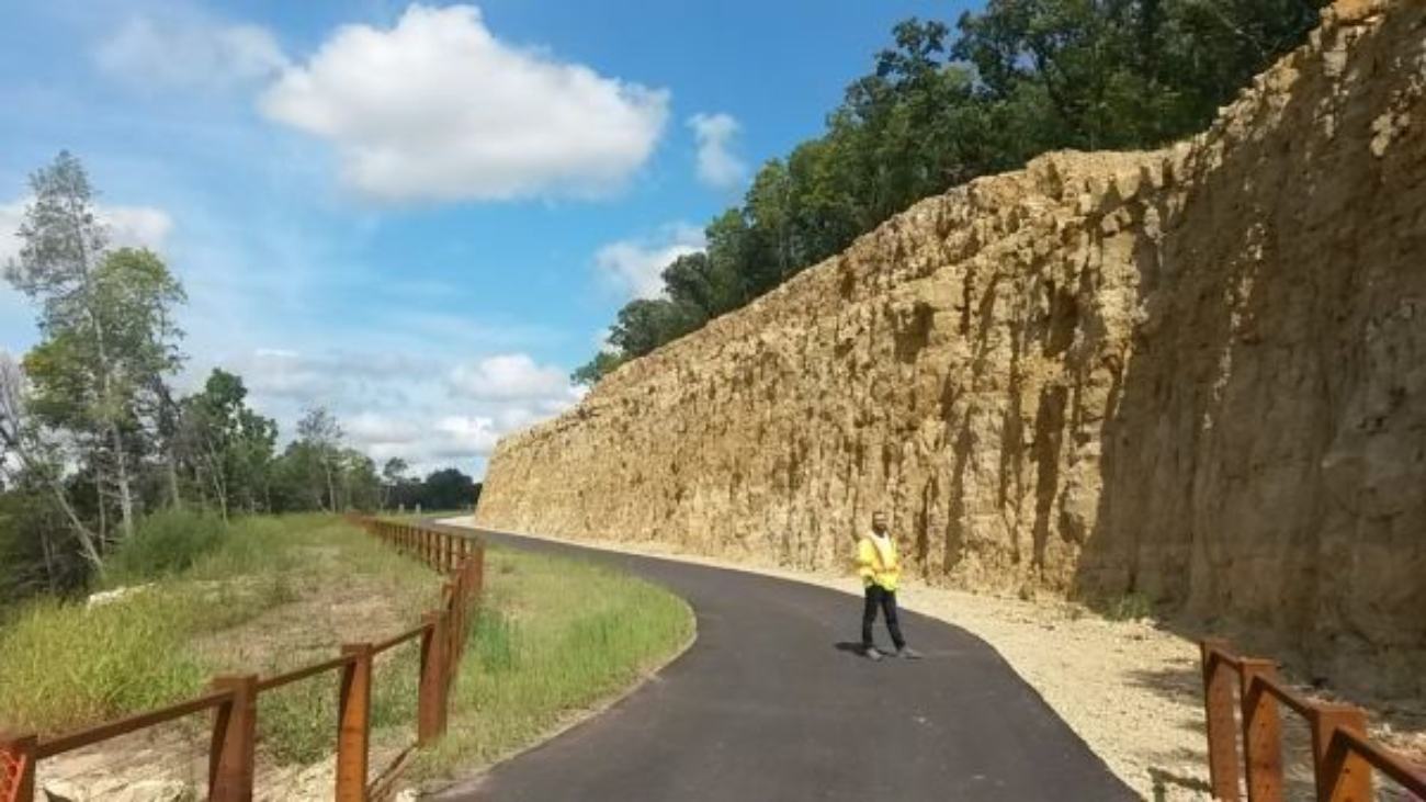 Mississippi River Regional Trail - North Shore daytime person in yellow standing