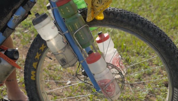 bike with water bottles attached bring water for long rides safety tips 2023