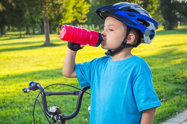 kid drinking water daytime biking ensure safety kids