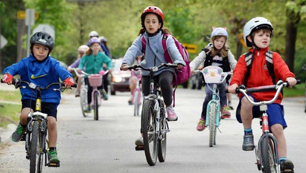 kid ride bike school protection daytime