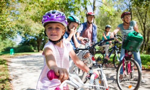 family biking happy daytime safety tips